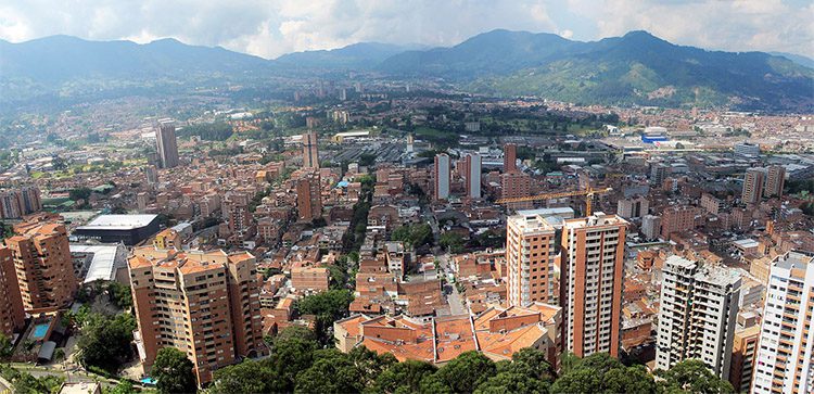 Panoramic of Antioquía, Sabaneta, El Retiro, Colombia showing apartment buildings in the foreground and mountains in the distance
