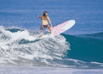 Surfer in Panama riding a wave break