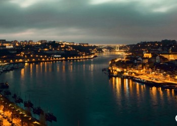 A nighttime view along a river in Portugal
