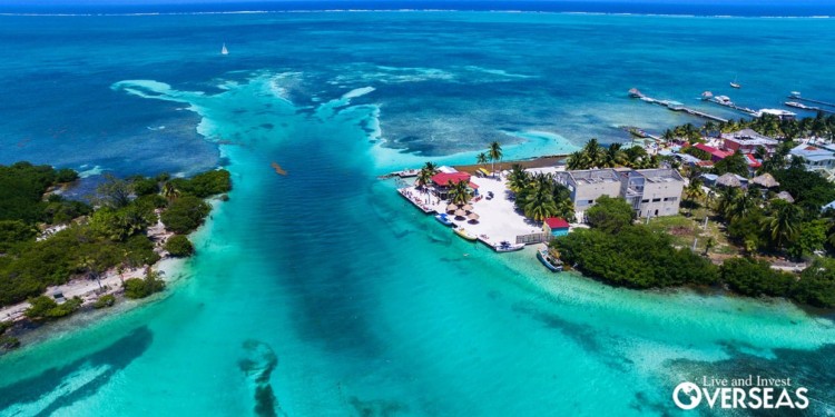 aerial view of the feep blue sea and colorful buildings on the coast of Belize