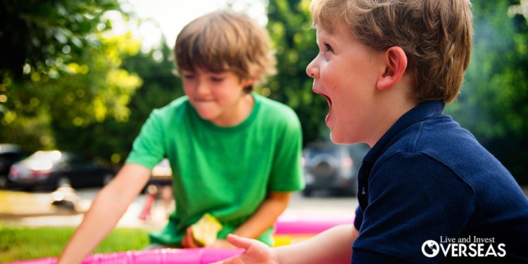 two boys playing outdoors