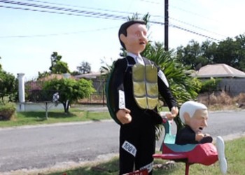 traditional paper machet dolls sit on the roadside in Panama