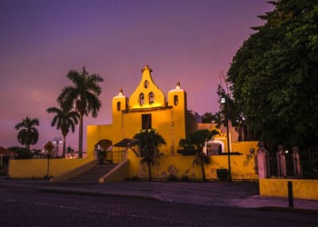 A church in Merida lit up at Dusk