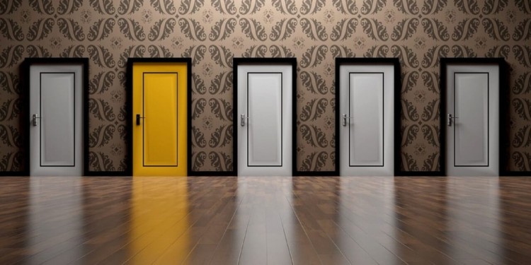 5 doors, one painted gold the rest painted silver.