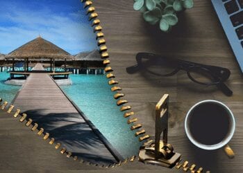 A Desk Being Unzipped To Reveal A Blue Sea And Tropical Huts