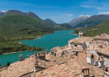 Abruzzo houses overlooking a lake and mountains