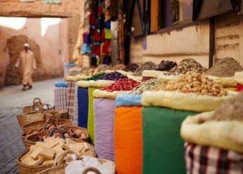 A spice vendor near his spices in Marrakech