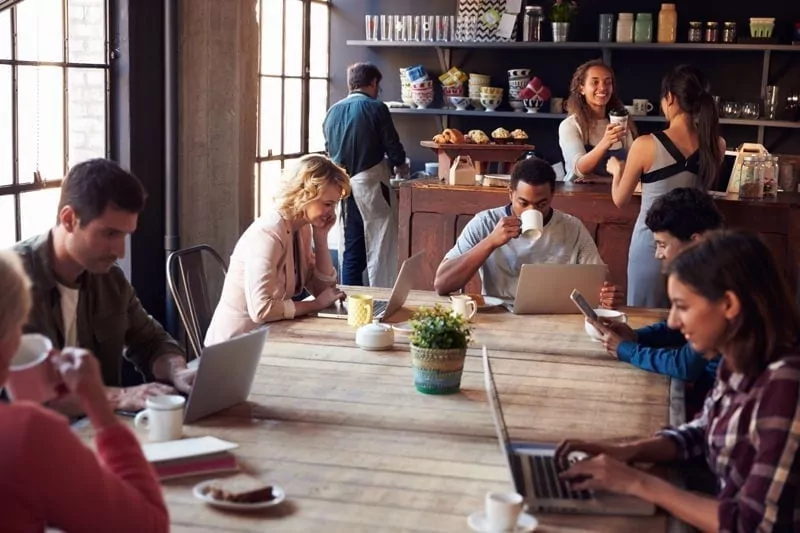 digital nomads working in cafe