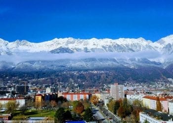 View of Innsbruck in Austria, with snowy mountains in the background