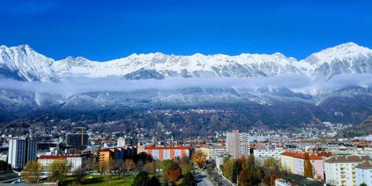 View of Innsbruck in Austria, with snowy mountains in the background