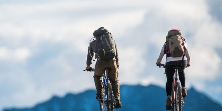 Two people on a cycle tour