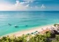 Best places to retire in Indonesia. Image of beach with clear blue sea