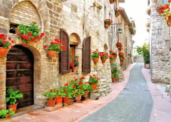 Picturesque lane with flowers in an Italian hill town