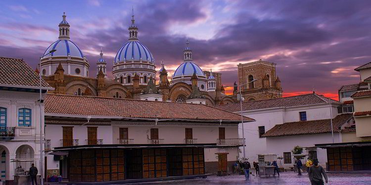 A cathedral in Cuenca, Ecuador during sunset
