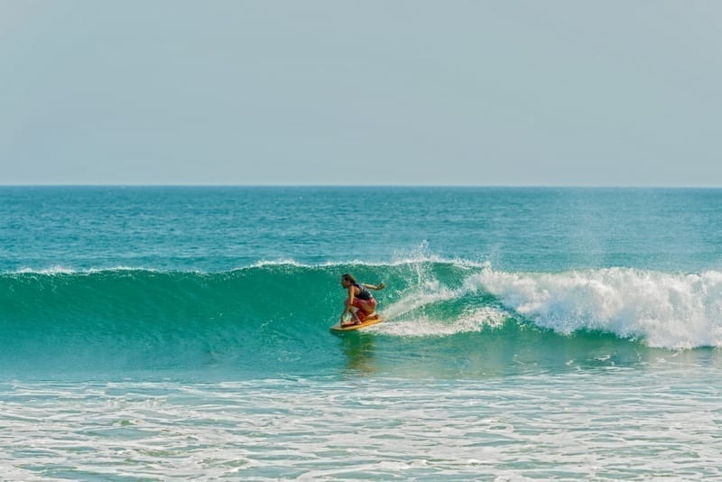 Man surfing in Playa Venao, Panama