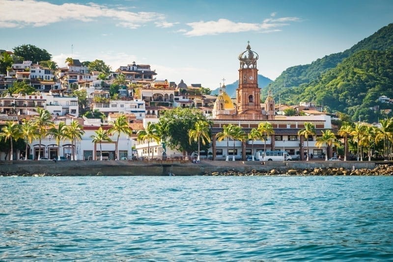 Colonia El Centro with church tower, Banderas Bay Coast Line, Puerto Vallarta, Mexico.