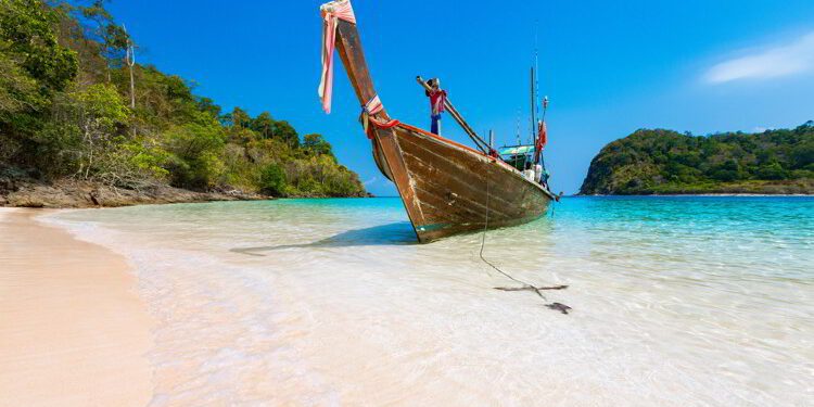 Long tail boat against blue sky and sea. Koh Rok island, Krabi, Thailand