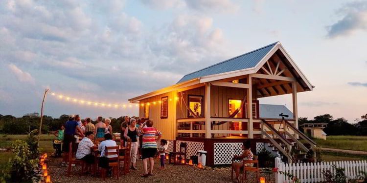 Expats eating dinner in Carmelita Gardens, Belize