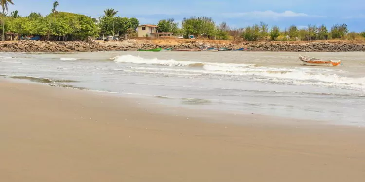 Small fisherman boats at the bay and the houses in El Rompio village near town of Chitre in Panama