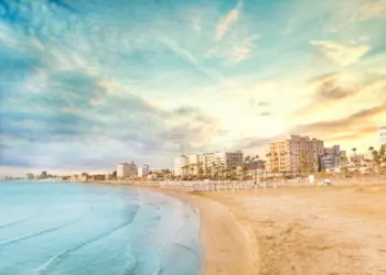 Beautiful view of the main street of Larnaca and Phinikoudes beach in Cyprus