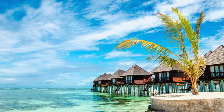 Exotic wooden huts on the water, Maldives
