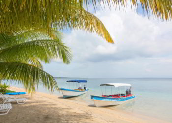 Boats at the Starfish beach, archipelago Bocas del Toro, Panama