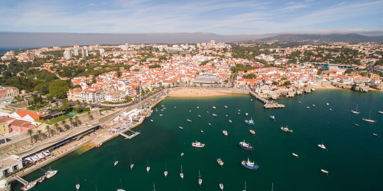Yacht near beautiful beach and marina of Cascais, Portugal