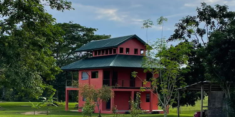 A beautiful red house in Carmelita Gardens, Belize