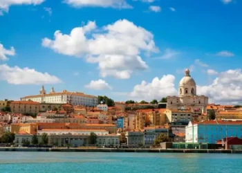 View of the old city of Lisbon, from across the Tagus Estuary, Portugal.