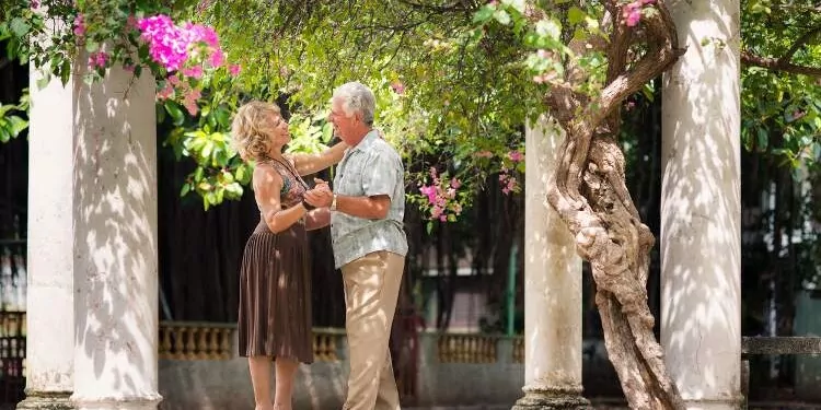 Happy senior couple dancing for fun
