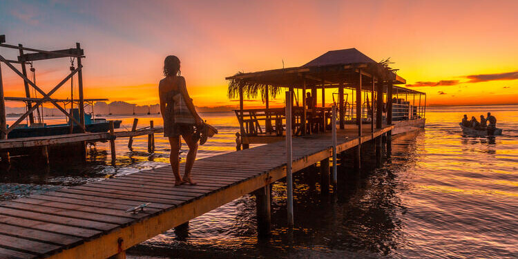 sunset on a pier, on Roatan Island. Honduras
