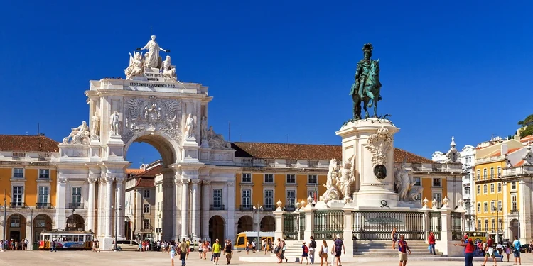 Gate and statue of King Jose on the Commerce square (Praca do Comercio) in Lisbon, Portugal