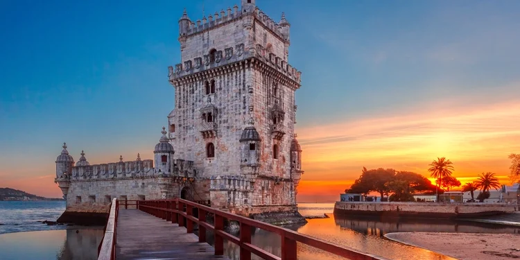 Belem Tower or Tower of St Vincent on the bank of the Tagus River at scenic sunset, Lisbon, Portugal