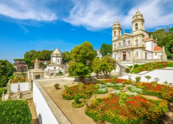 Historic Church of Bom Jesus do Monte and her public garden. Tenoes, Braga. The Basilica is a popular landmark and pilgrimage site in northern Portugal. Aerial landscape on the top of Braga mountain.