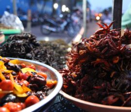 Spicy delicacies for sale at a market in Cambodia.